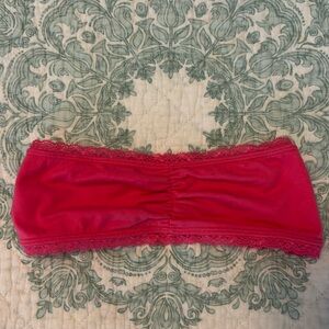 Bandeau bra wireless strapless. Hot pink with lace back
